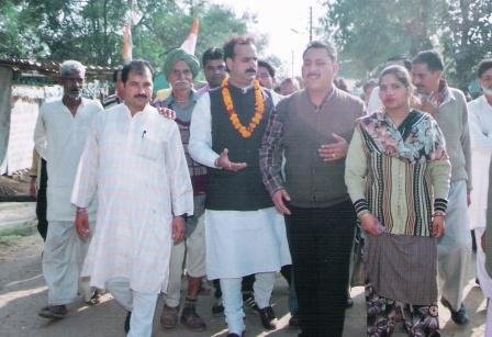 J.s Nayol with supporters and workers at a rally during elections